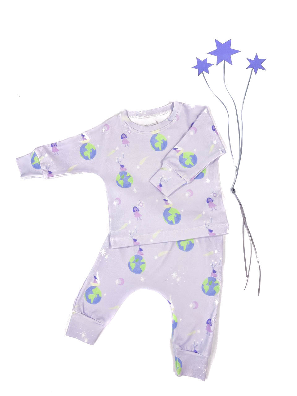 A playset for girls including a purple long-sleeved top and bottom with a pattern of a girl standing on top of the world reaching for stars, and three paper purple star accessories on a white background.