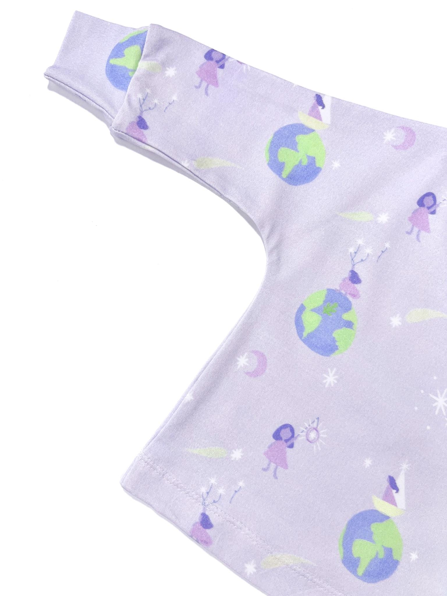 Close-up of the lavender star balloon fabric pattern showing the hidden Tall Trees signature leaf and premium knit texture.